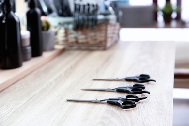 Different scissors at hairdresser's workplace