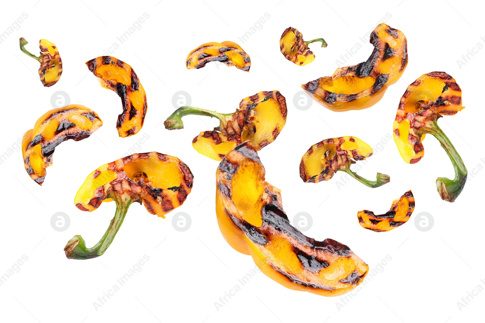 Image of Slices of grilled bell peppers in air on white background