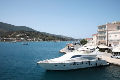 Photo of Beautiful view of sea with boats and coastal city