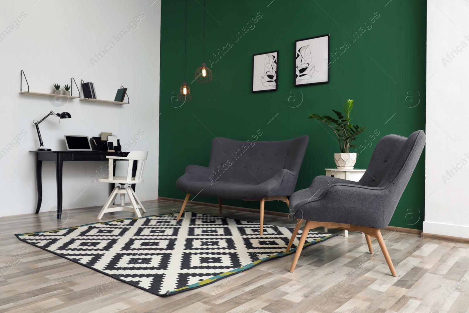 Photo of Modern living room interior stylish sofa near green wall