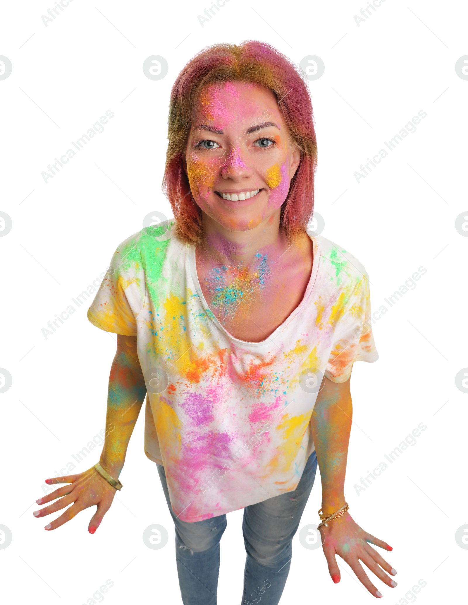 Photo of Woman covered with colorful powder dyes on white background. Holi festival celebration