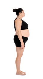 Full length portrait of fat woman on white background. Weight loss