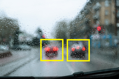 Image of Blurred view of road with scanner frames on cars through wet automobile window. Machine learning