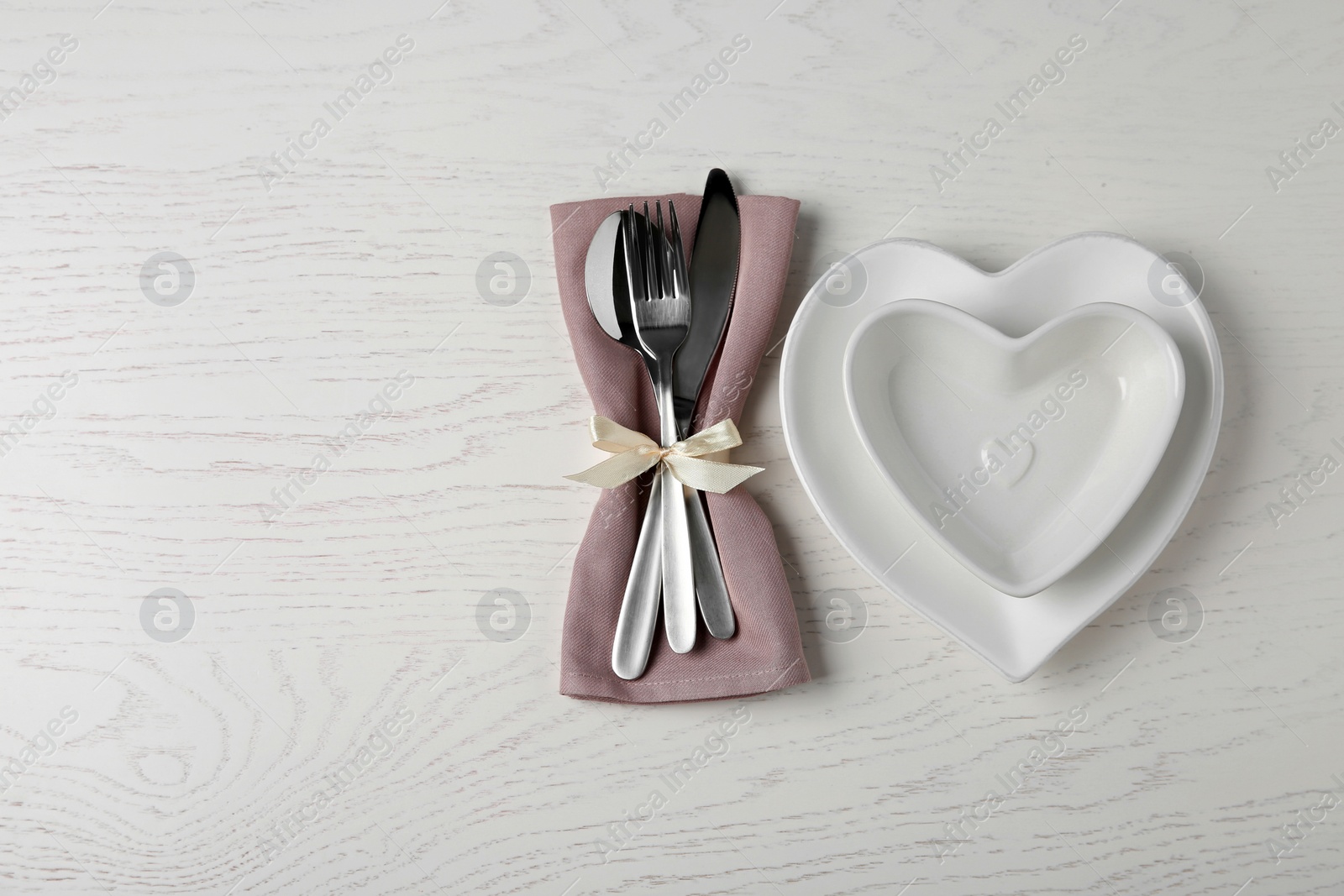 Photo of Beautiful table setting on white wooden background, flat lay. Space for text