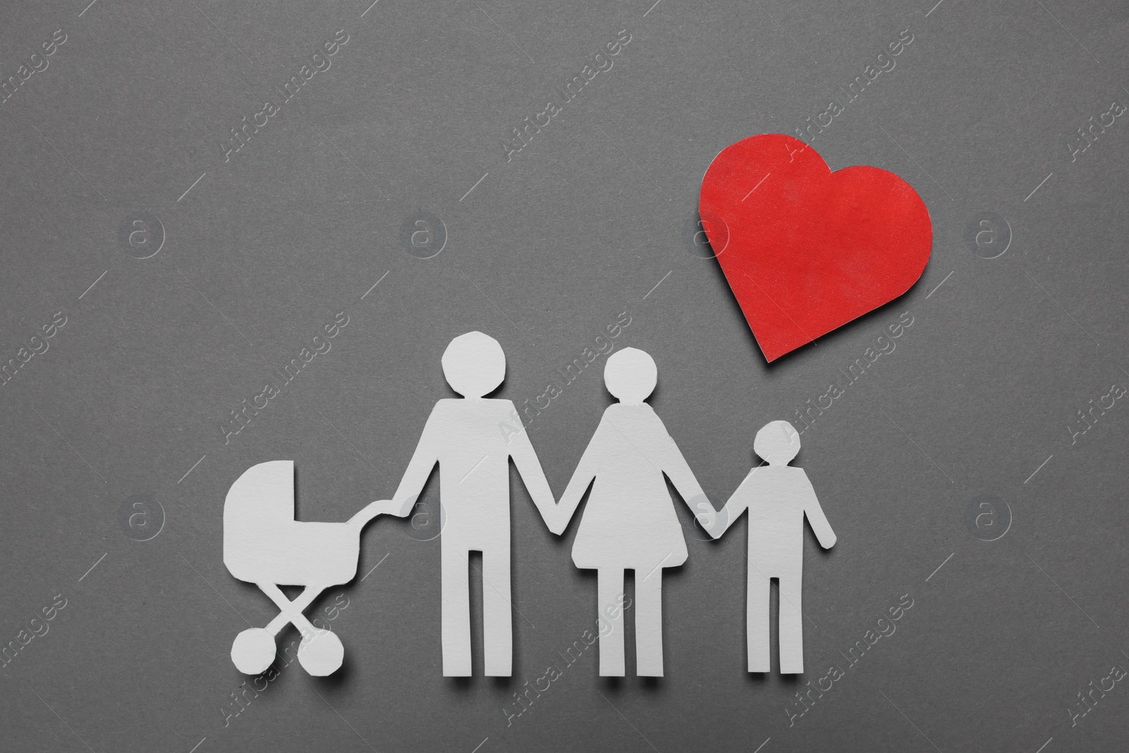 Photo of Paper family figures and red heart on grey background, flat lay. Insurance concept