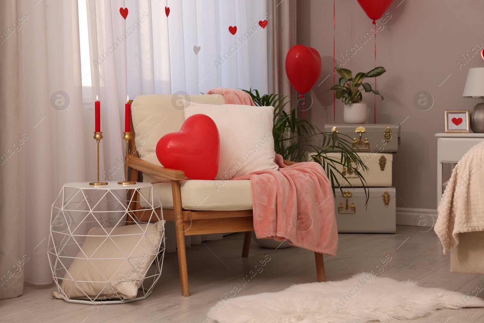 Photo of Cozy room decorated for Valentine Day. Interior design