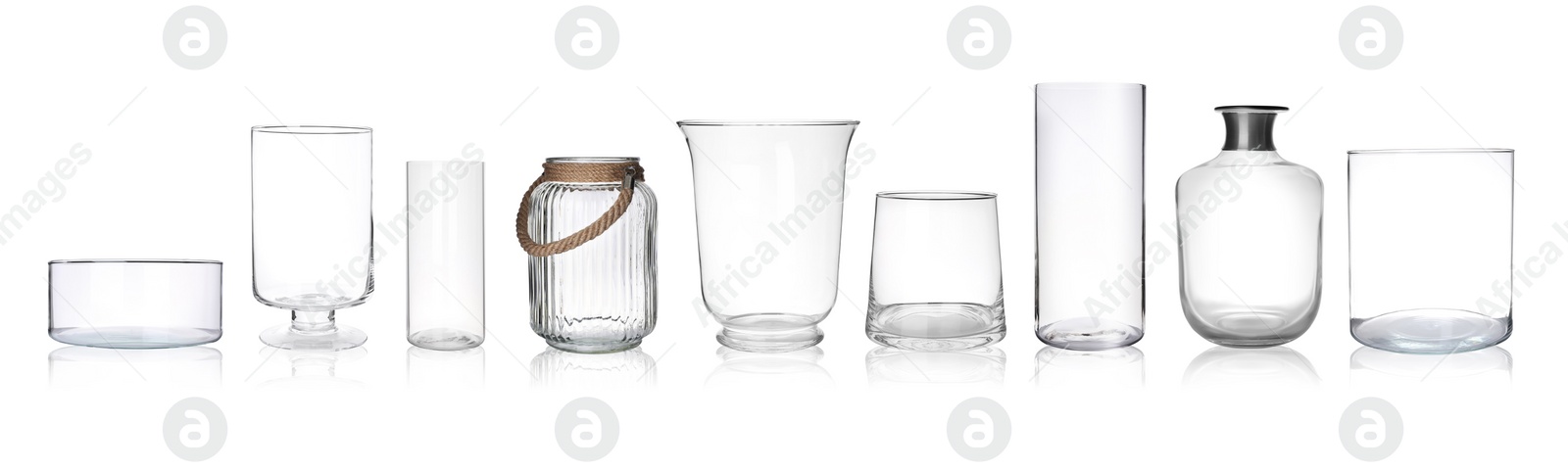 Image of Set of empty glass vases on white background. Banner design