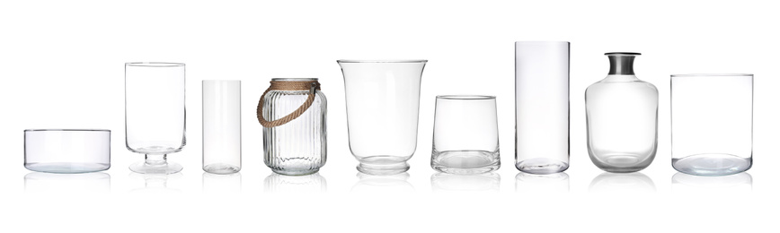 Image of Set of empty glass vases on white background. Banner design