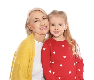 Photo of Portrait of mature woman and her granddaughter isolated on white