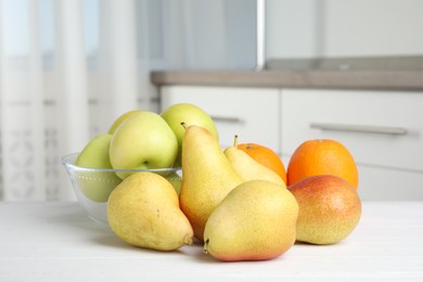 Photo of Different fresh fruits on white wooden table indoors. Food poisoning concept