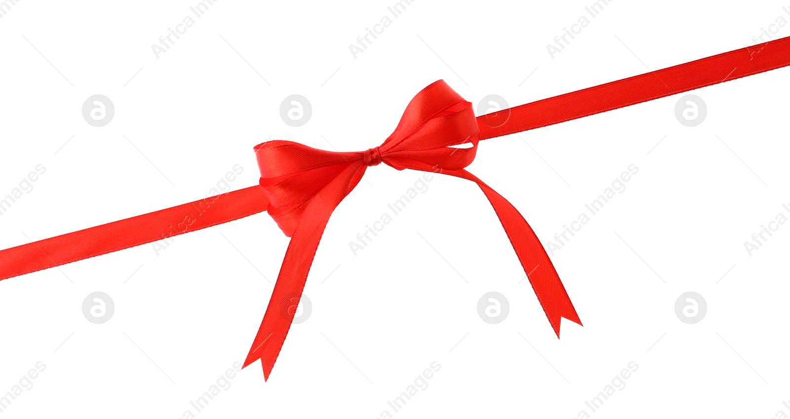 Photo of Red ribbon with bow on white background. Festive decoration