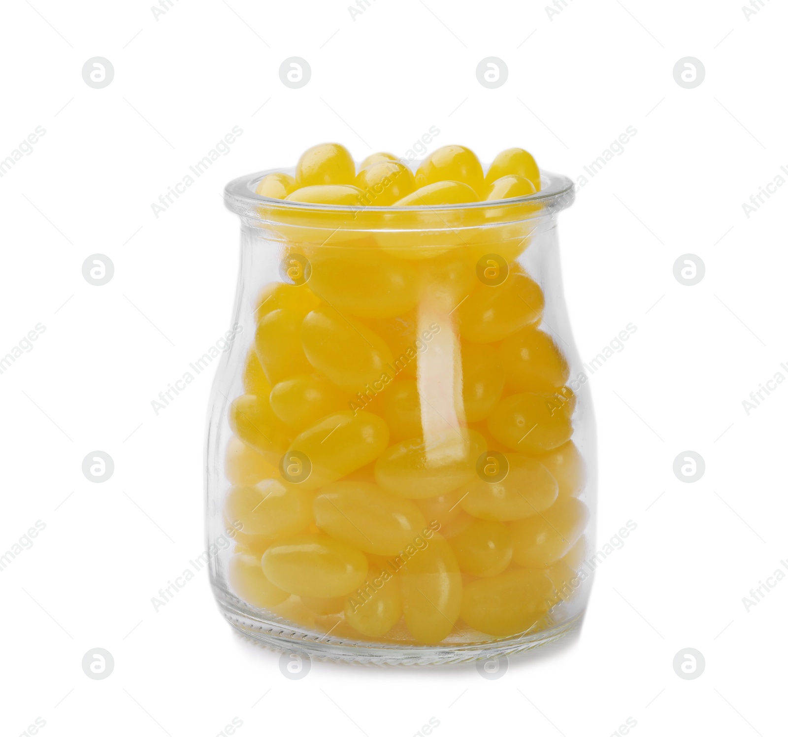 Photo of Tasty small lemon drops in glass jar isolated on white