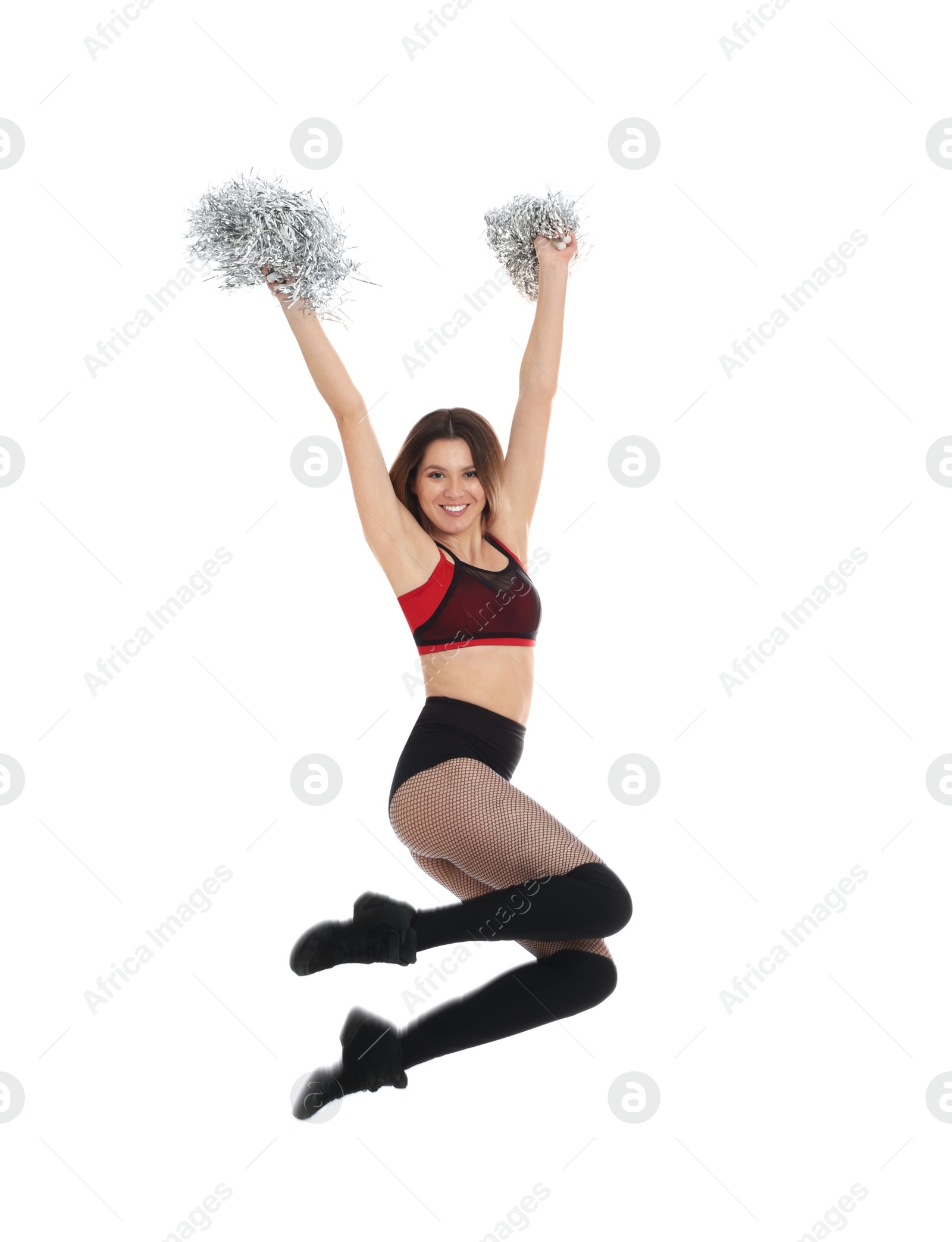 Photo of Beautiful cheerleader with pom poms jumping on white background