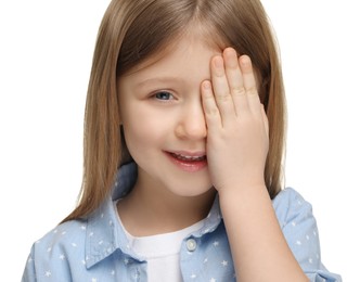 Photo of Little girl covering her eye on white background