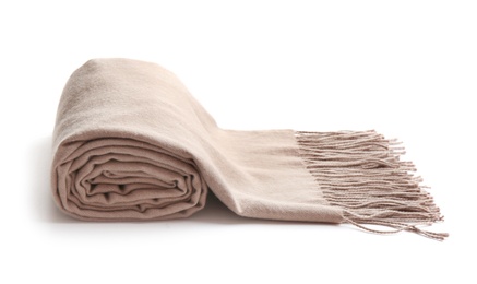 Stylish rolled scarf on white background. Winter clothing