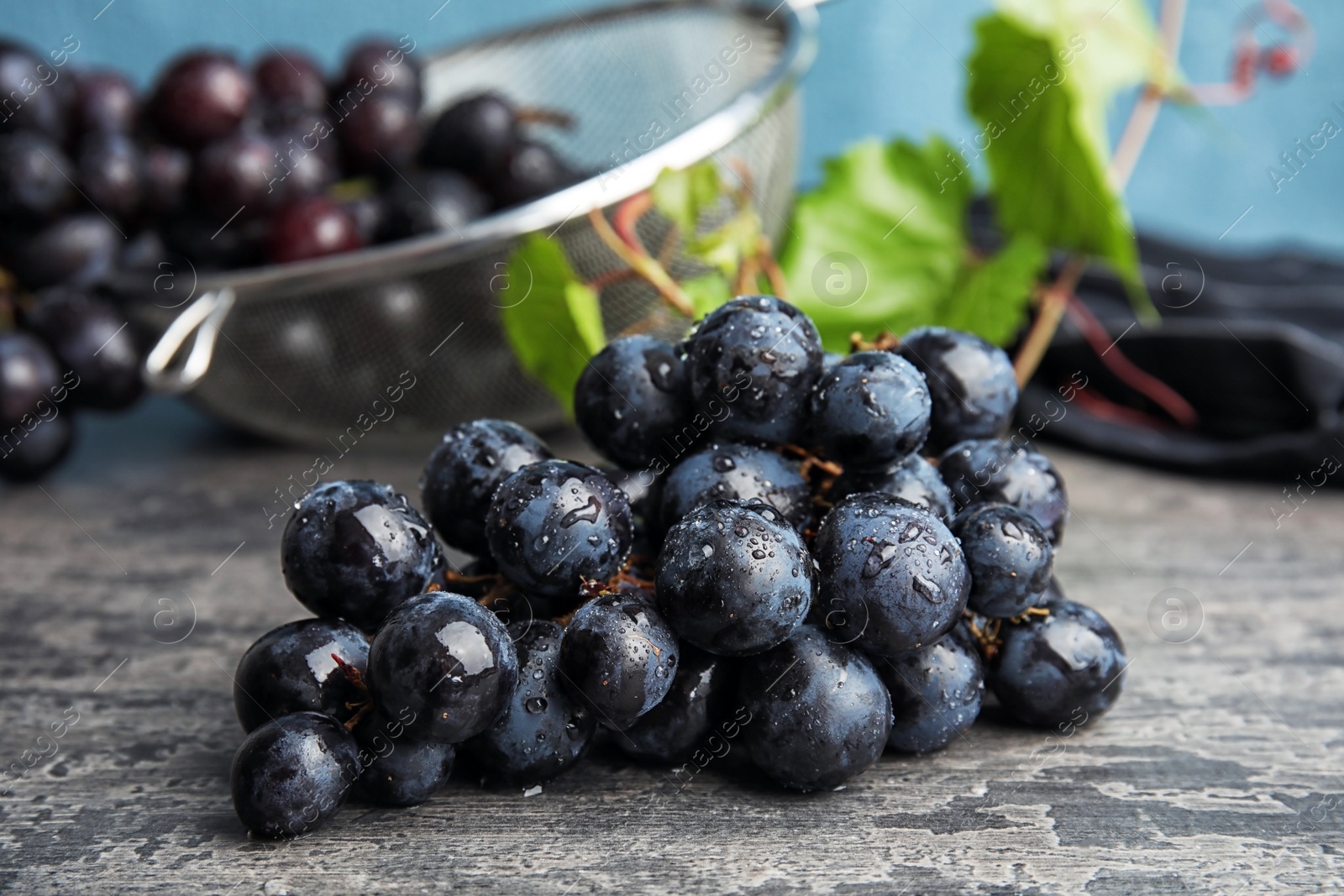 Photo of Fresh ripe juicy grapes on table. Wine ingredient