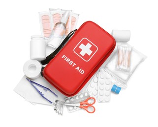 Photo of Red first aid kit, scissors, cotton buds, pills, plastic forceps, hand sanitizer, medical plasters and elastic bandage isolated on white, top view