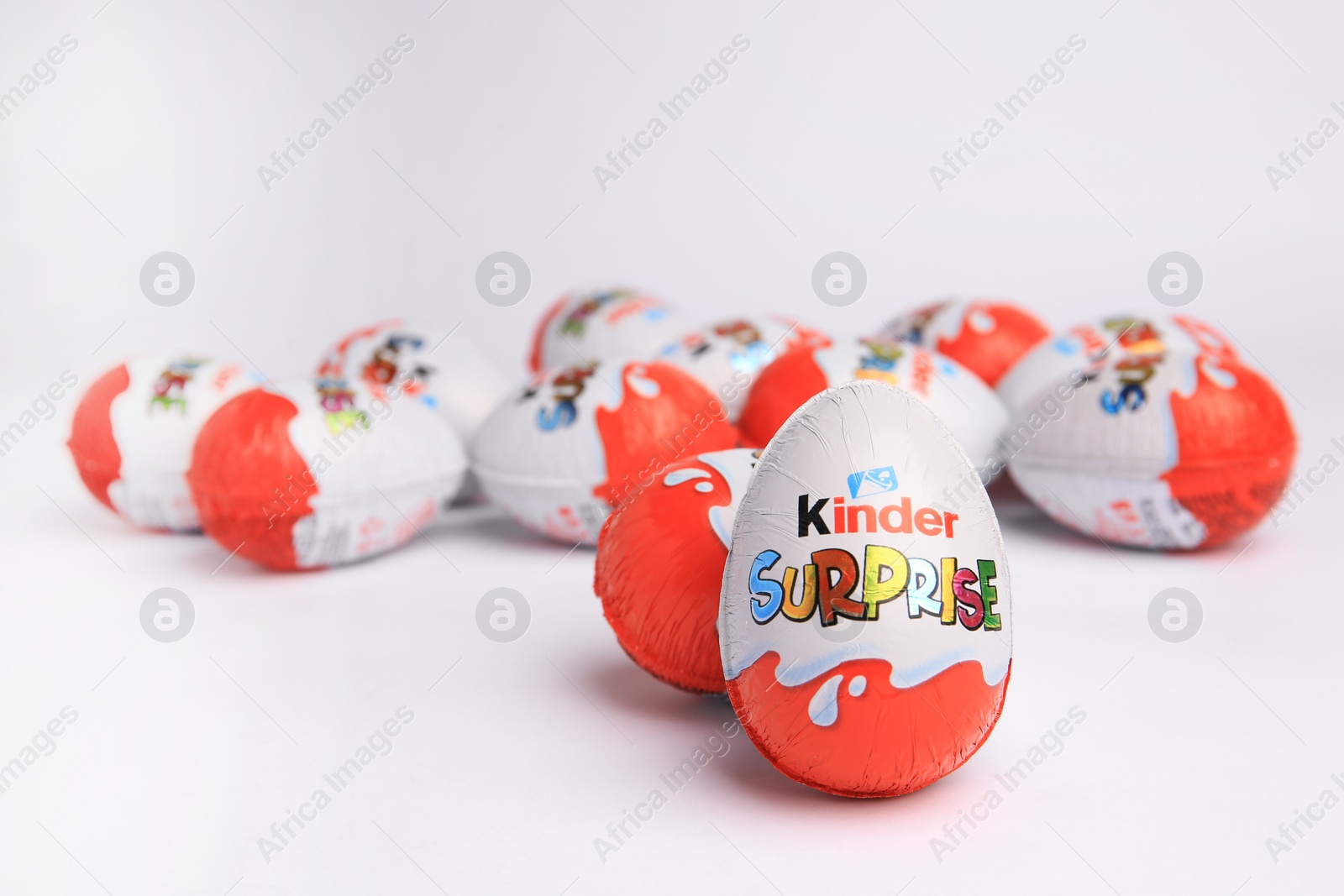 Photo of Sveti Vlas, Bulgaria - June 26, 2023: Kinder Surprise Eggs on white background. Space for text