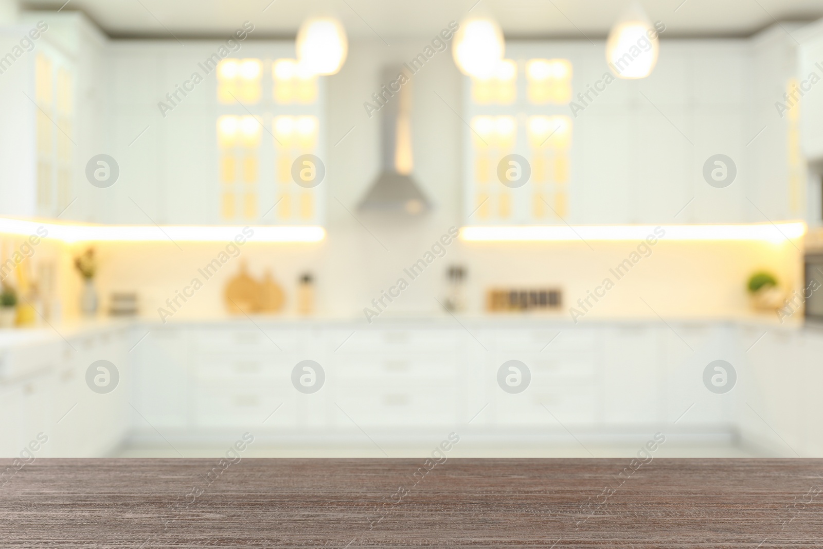 Image of Empty wooden table and blurred view of stylish kitchen interior. Mockup for design