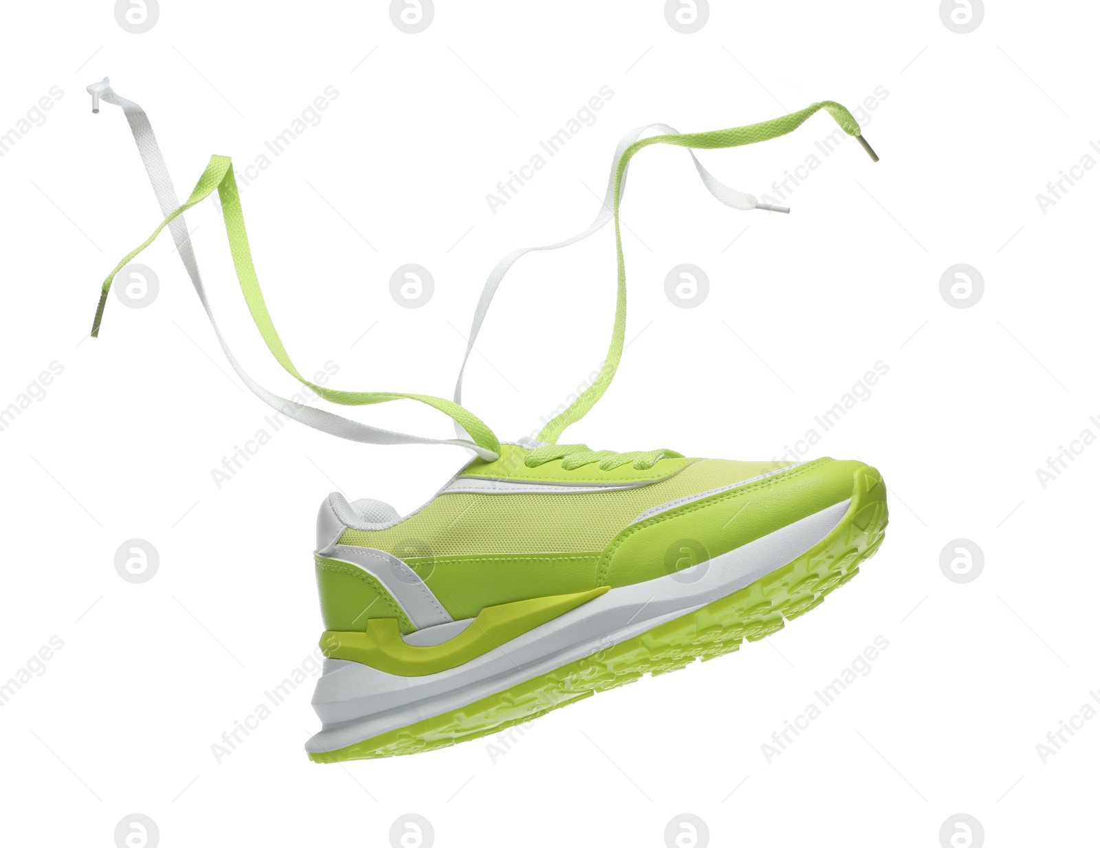 Photo of One stylish light green sneaker isolated on white