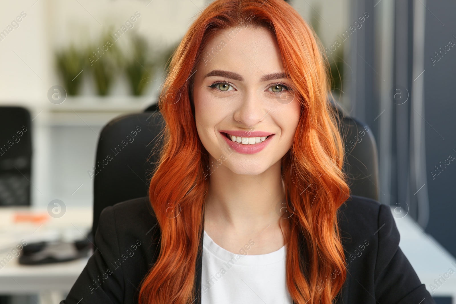 Photo of Happy woman having video call in office, view from web camera