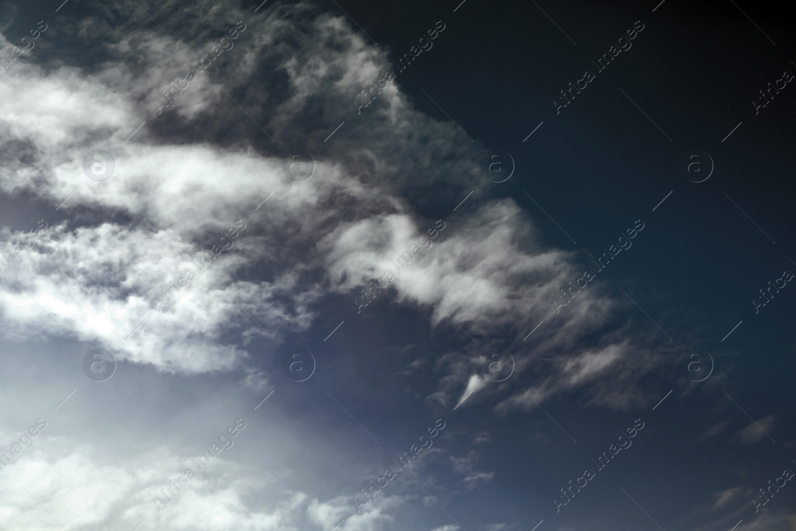 Image of Sky covered with rainy clouds. Stormy weather