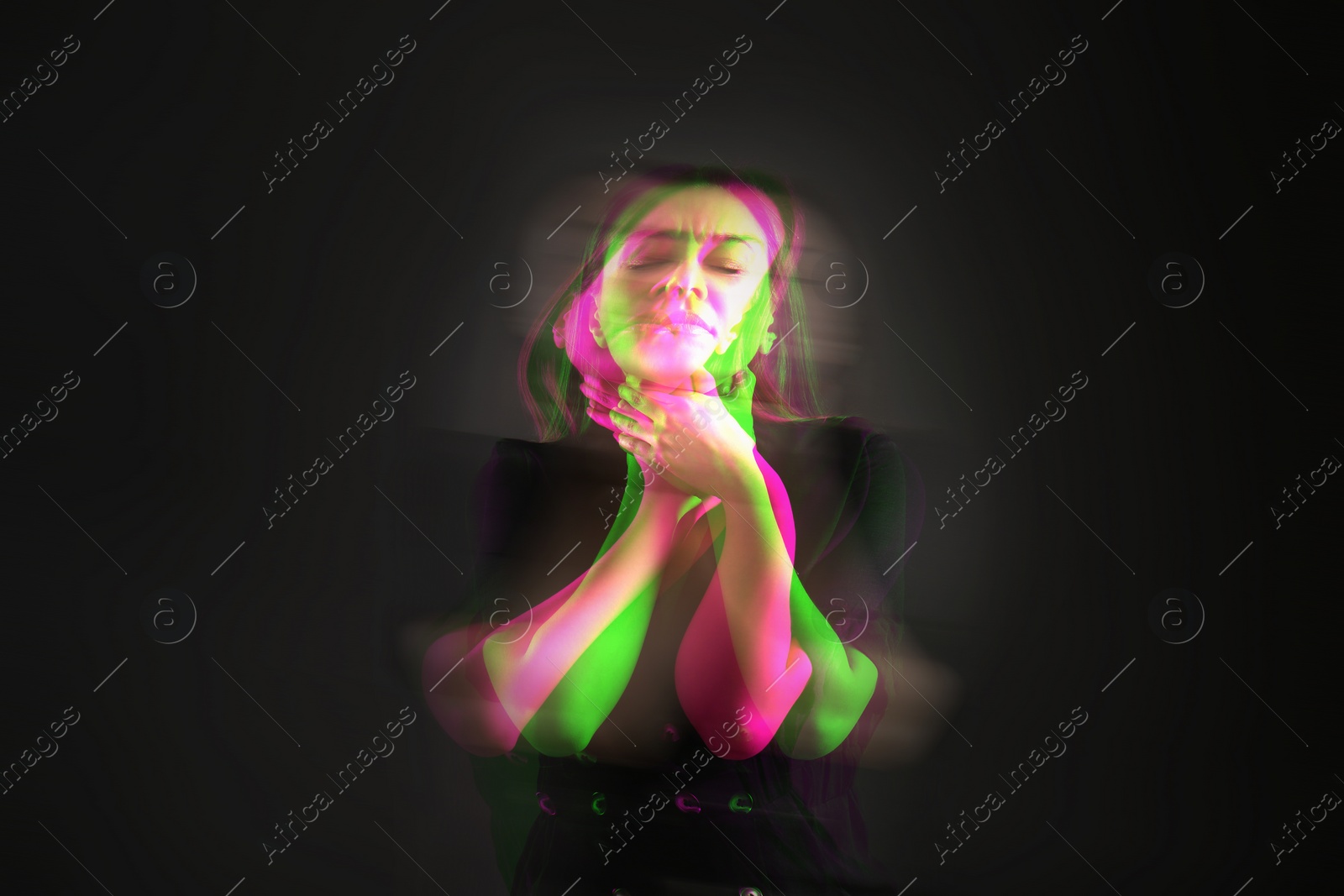 Image of Woman suffering from paranoia on black background, glitch effect