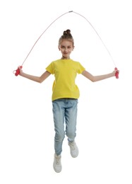 Photo of Cute little girl with jump rope on white background