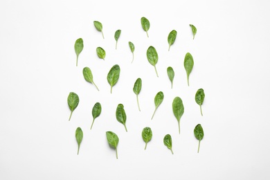 Fresh green healthy spinach on white background, top view