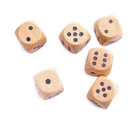 Photo of Many wooden game dices isolated on white, above view