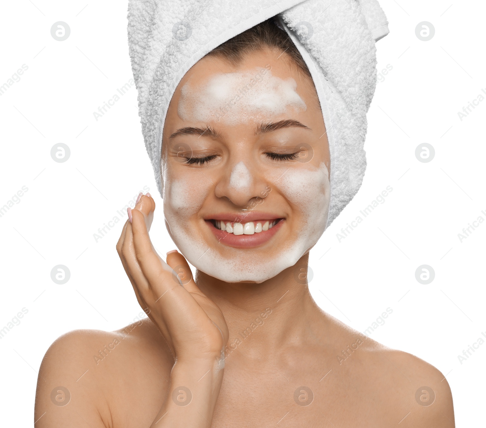 Photo of Young woman washing face with cleansing foam on white background. Skin care cosmetic