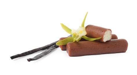 Photo of Glazed curd cheese bars, vanilla pods and flower isolated on white