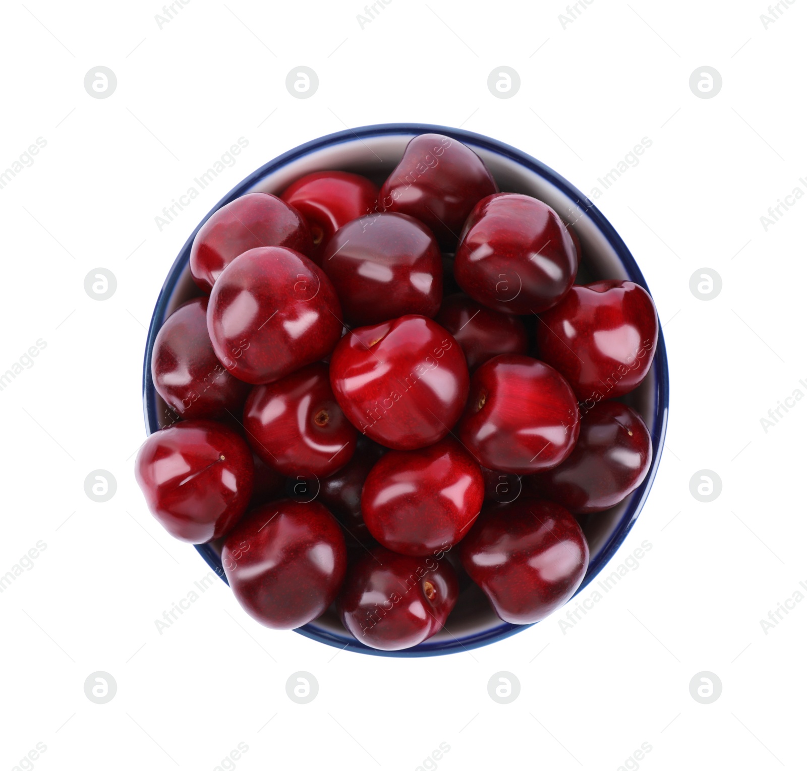 Photo of Tasty ripe red cherries in bowl isolated on white, top view