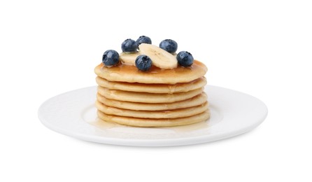 Delicious pancakes with banana slices, blueberries and honey isolated on white