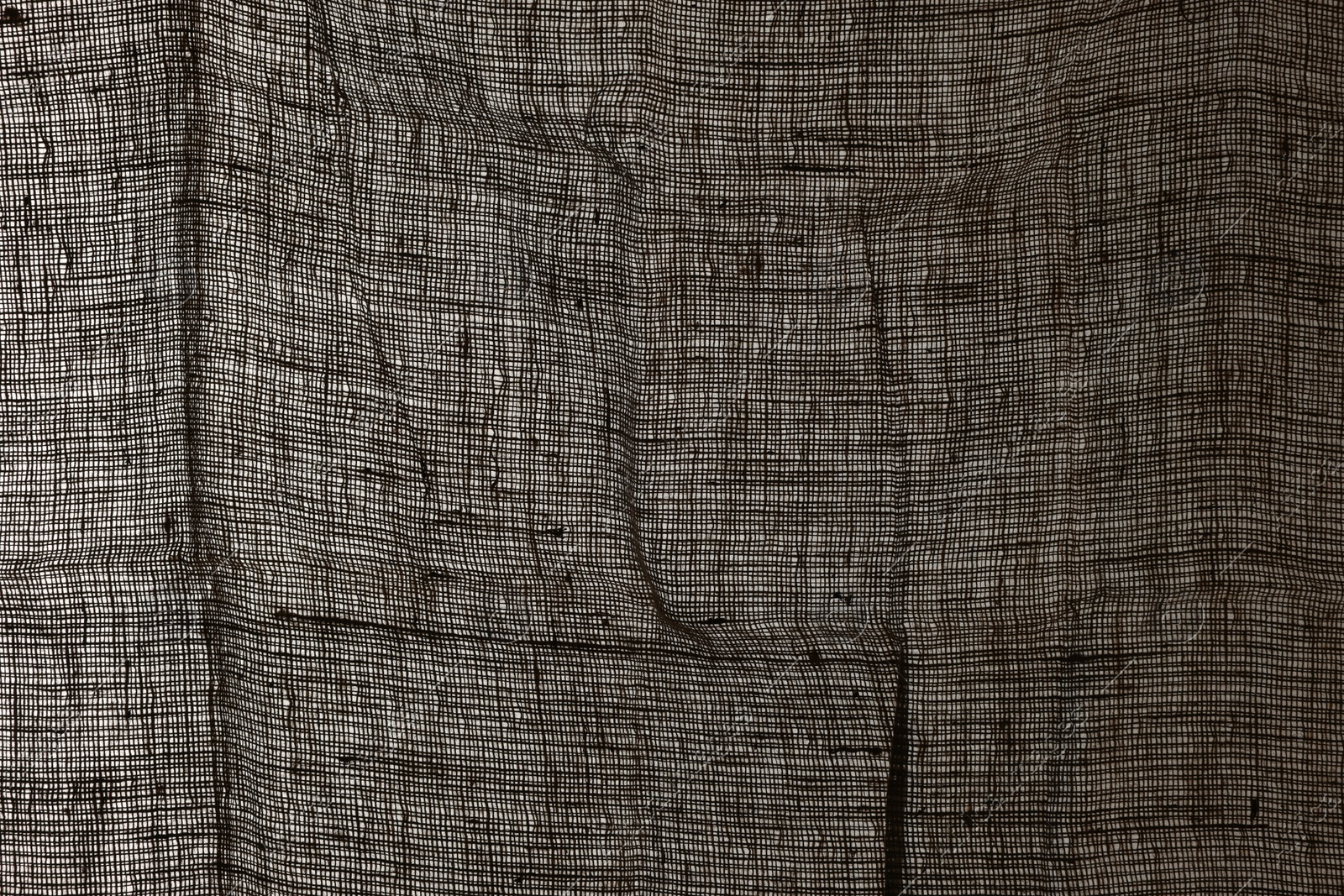 Photo of Texture of natural burlap fabric as background, closeup