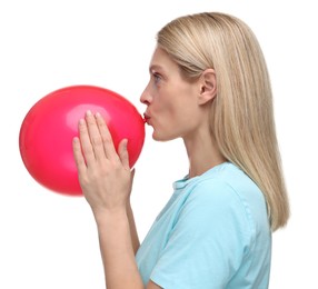 Photo of Woman blowing up balloon on white background