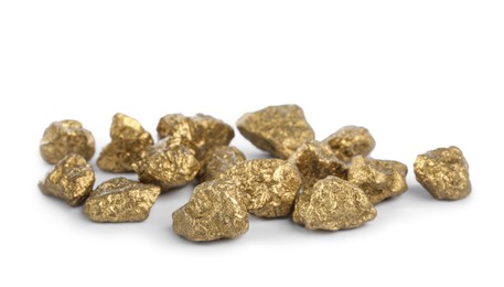 Pile of gold nuggets on white background