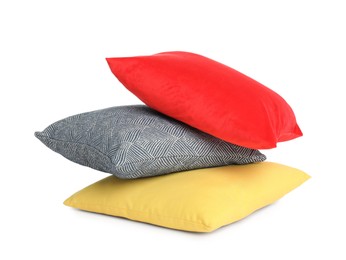 Different colorful decorative pillows on white background