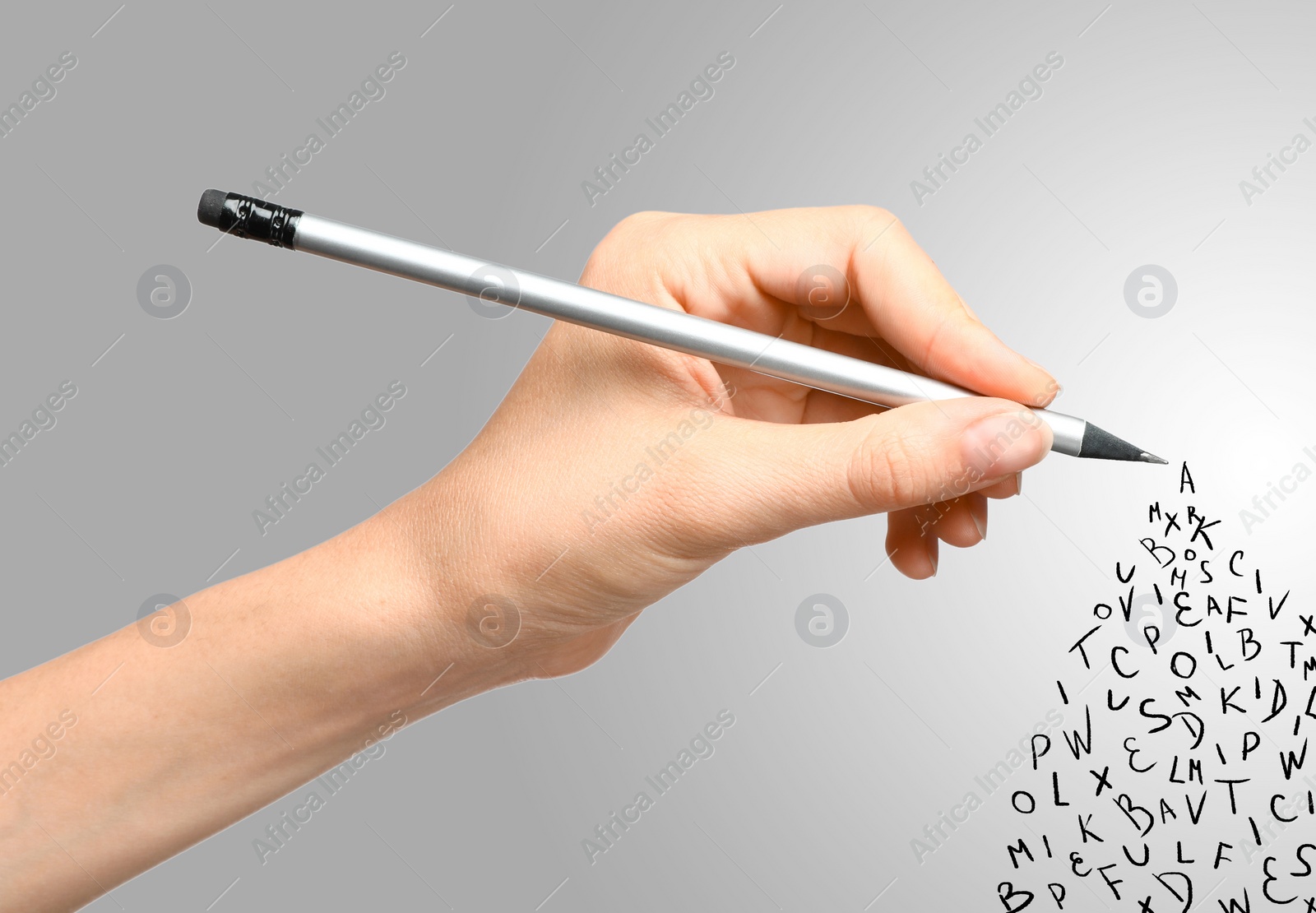 Image of Woman writing letters and they flying away on grey gradient background, closeup