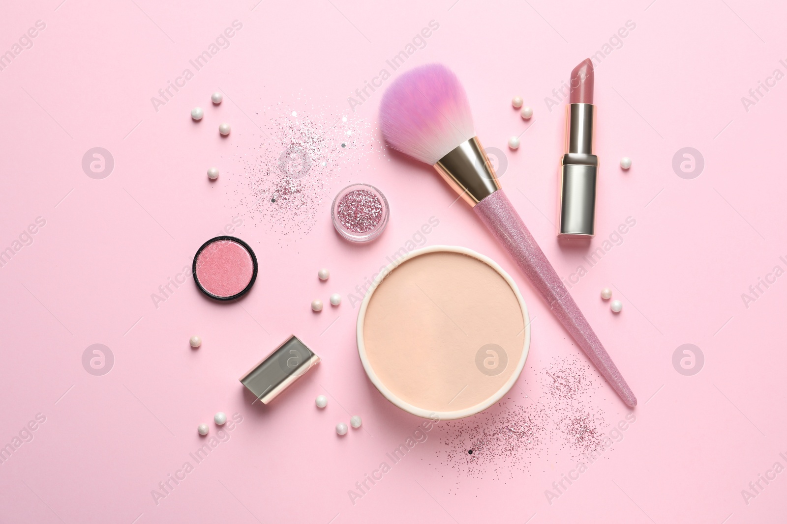 Photo of Flat lay composition with makeup brushes on pink background