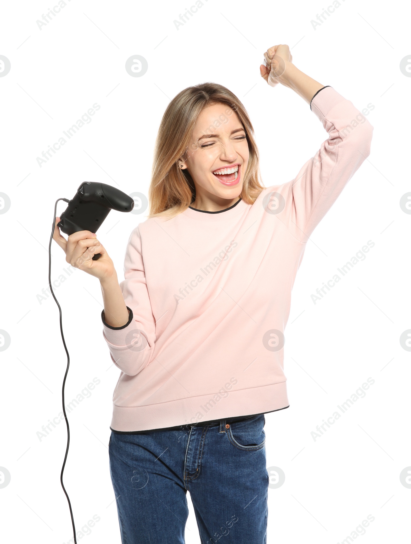 Photo of Emotional young woman playing video games with controller isolated on white