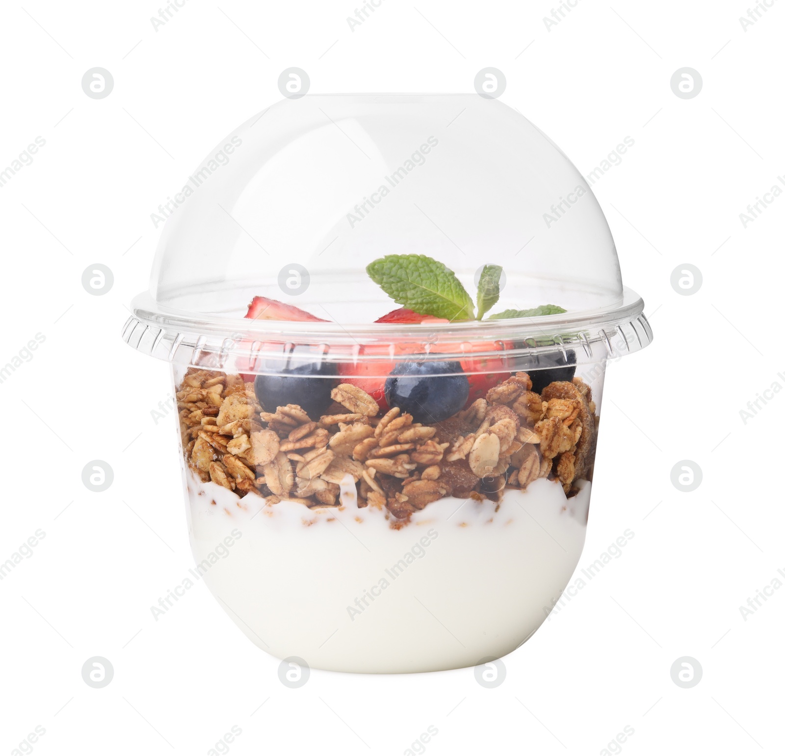 Photo of Tasty granola with berries and yogurt in plastic cup isolated on white