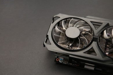 Photo of One graphics card on black background, closeup. Space for text