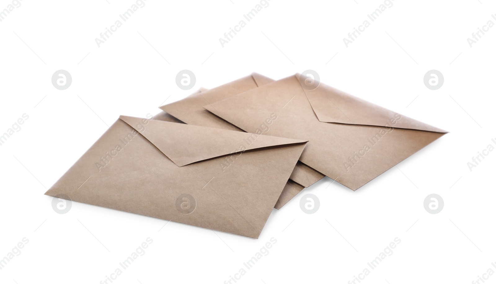 Photo of Heap of brown paper envelopes on white background