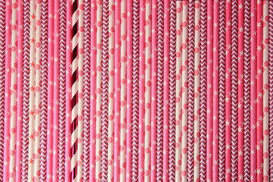 Many paper drinking straws as background, top view