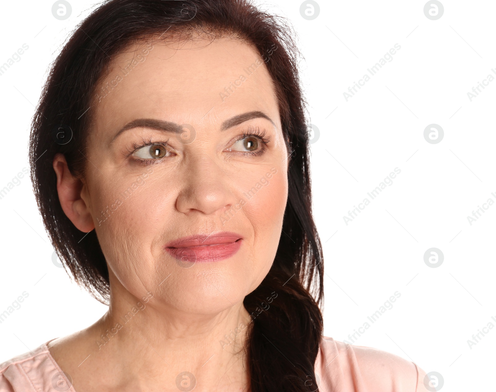 Photo of Portrait of charming mature woman with healthy beautiful face skin and natural makeup on white background, closeup