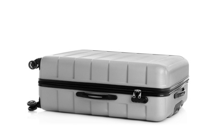 Grey suitcase for travelling on white background