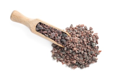 Photo of Black salt and wooden scoop on white background, top view