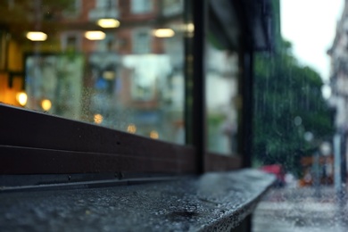 Closeup view of building on rainy day, outdoors