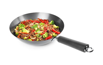 Photo of Stir-fry. Tasty noodles with meat and vegetables in wok isolated on white